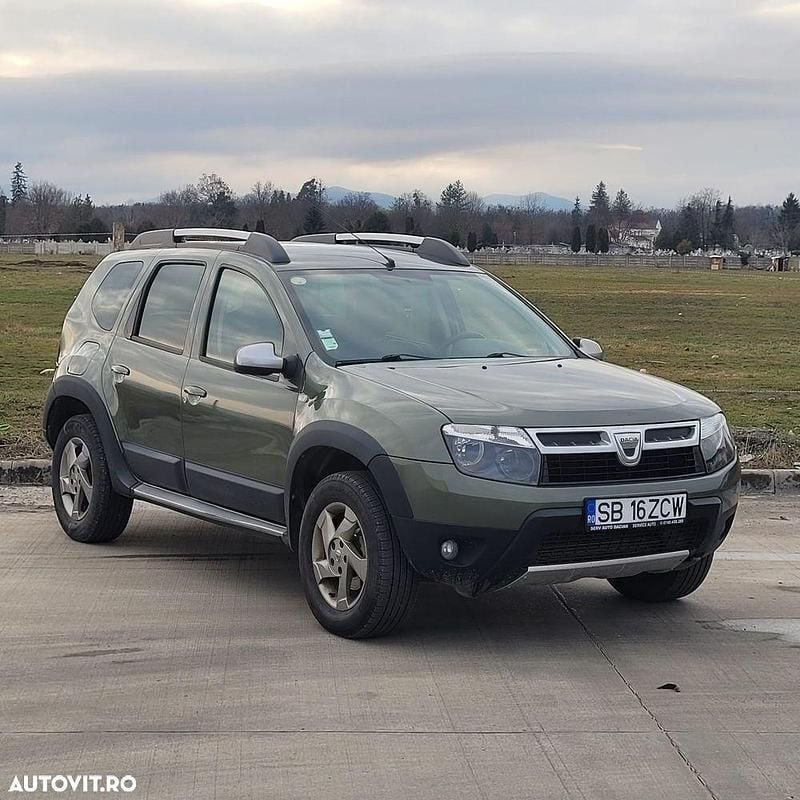 Culoareverde Second-hand 2013 Dacia Duster Prestige SUV | 8.190 EUR (Preț OK) - Imagine 1/4
