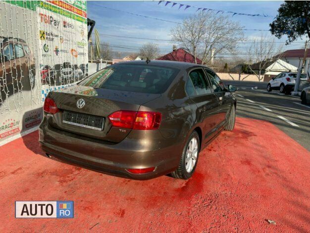 Maro Utilizat 2012 VW Jetta Berlinǎ | 7.499 EUR (Puțin scump) - Imagine 1/4