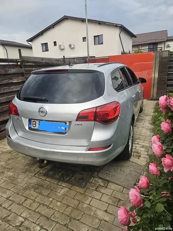 Second-hand Opel Astra Sport 110 CP (80 kW) 2011 Gri Hatchback