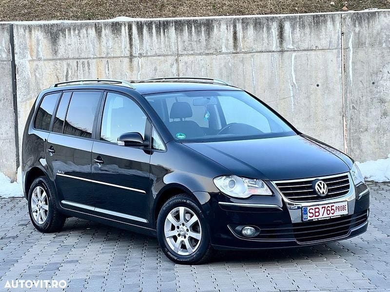 Second-hand VW Touran Highline 140 CP (102 kW) 2009 Culoarenegru Monovolum