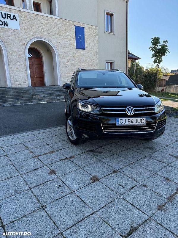 Culoarenegru Utilizat 2013 VW Touareg SUV | 16.190 EUR (Preț bun) - Imagine 1/4