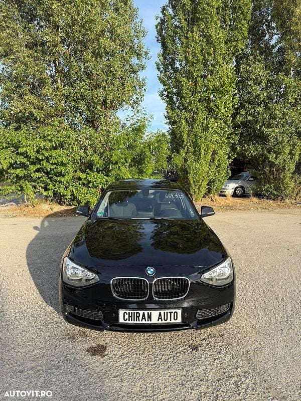 Culoarenegru Utilizat 2013 BMW 116 Hatchback | 7.699 EUR (Preț OK) - Imagine 1/4