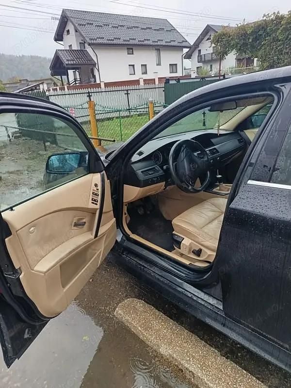 Second-hand BMW 520 164 CP (120 kW) 2005 Negru Berlinǎ