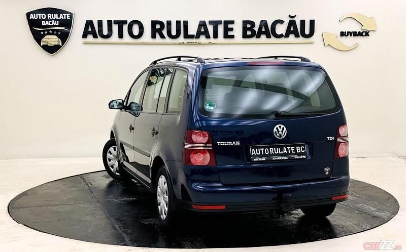 Second-hand VW Touran 105 CP (77 kW) 2007 Culoarealbastru Monovolum