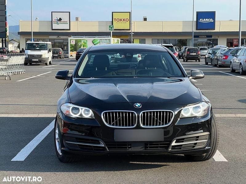 Second-hand BMW 520 Comfort Edition 184 CP (135 kW) 2014 Negru Berlinǎ