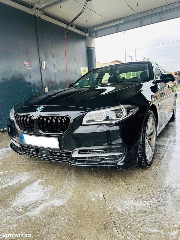 Culoarenegru Utilizat 2016 BMW 520 Berlinǎ | 15.700 EUR (Preț bun) - Imagine 1/4