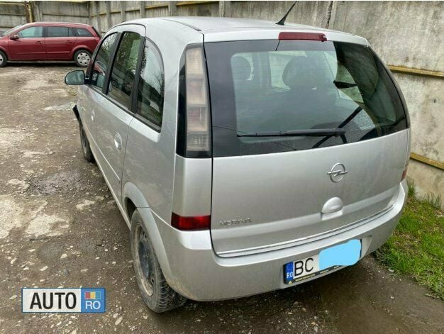 Second-hand Opel Meriva 66 CP (48 kW) 2010 Argintiu Monovolum