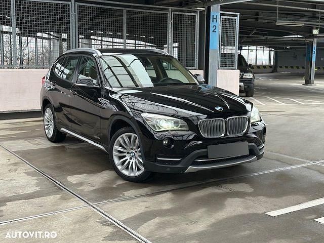 Culoarenegru Utilizat 2014 BMW X1 SUV | 12.900 EUR (Super Preț) - Imagine 1/4
