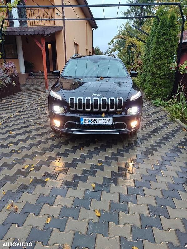 Culoarenegru Utilizat 2014 Jeep Cherokee Limited SUV | 9.900 EUR - Imagine 1/4