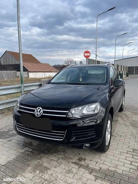 Culoarenegru Utilizat 2011 VW Touareg SUV | 10.500 EUR - Imagine 1/4