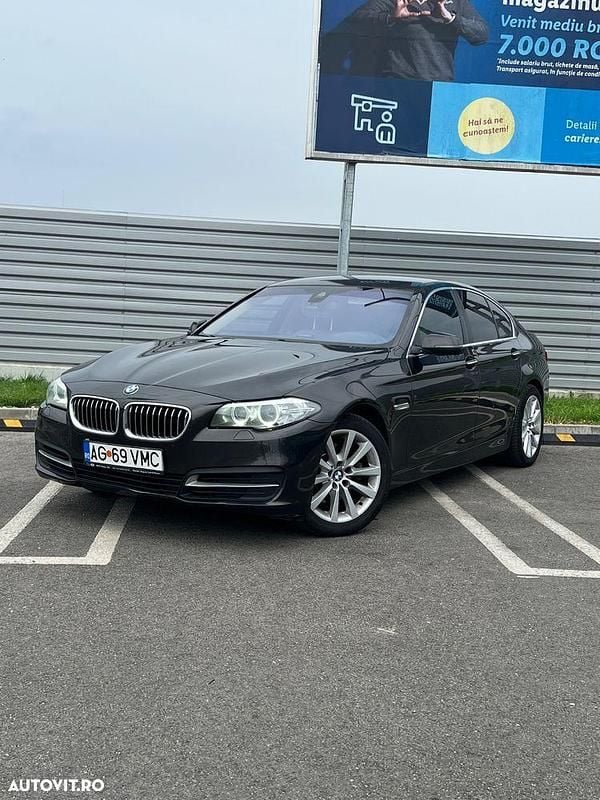 Culoarenegru Utilizat 2014 BMW 520 Comfort Edition Berlinǎ | 12.500 EUR (Super Preț) - Imagine 1/4