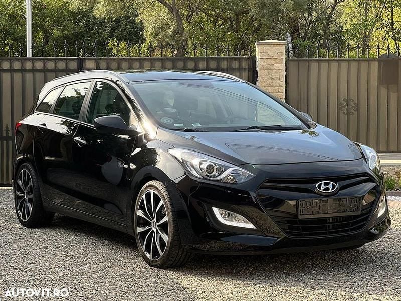 Culoarenegru Utilizat 2014 Hyundai i30 Passion Break | 5.300 EUR (Super Preț) - Imagine 1/4