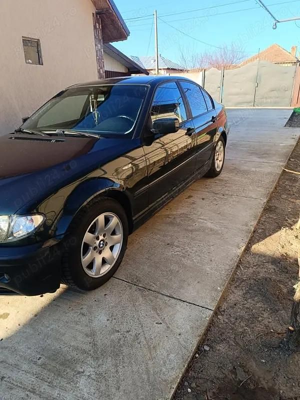 Second-hand BMW 318 143 CP (105 kW) 2002 Verde Berlinǎ