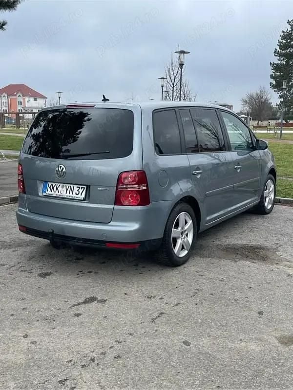 Second-hand VW Touran 105 CP (77 kW) 2009 Gri Monovolum