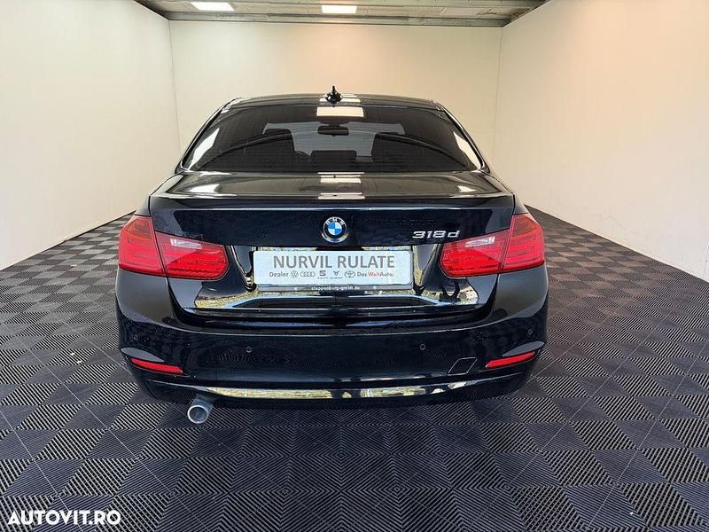 Culoarenegru Utilizat 2012 BMW 318 Comfort Edition Berlinǎ | 10.890 EUR (Scump) - Imagine 1/4