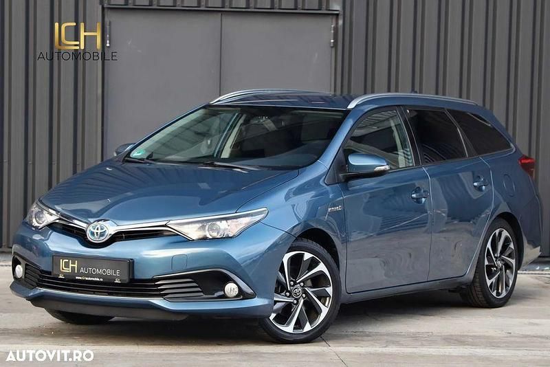 Culoarealbastru Utilizat 2015 Toyota Auris Hybrid Design Break | 12.989 EUR (Preț OK) - Imagine 1/4