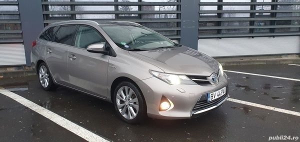 Maro Utilizat 2013 Toyota Auris Hybrid Executive Break | 8.950 EUR - Imagine 1/4