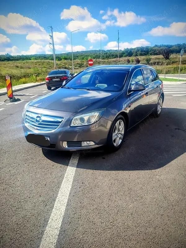 Second-hand Opel Insignia Sport 160 CP (117 kW) 2010 Gri Break