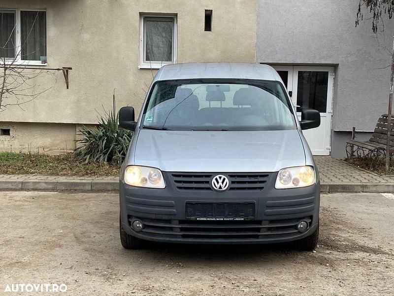 Second-hand VW Caddy Maxi 105 CP (77 kW) 2009 Culoareargint Monovolum