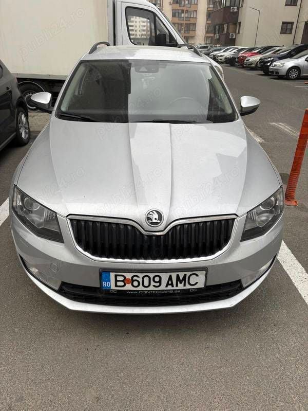 Argintiu Utilizat 2014 Skoda Octavia Break | 6.999 EUR (Preț bun) - Imagine 1/4