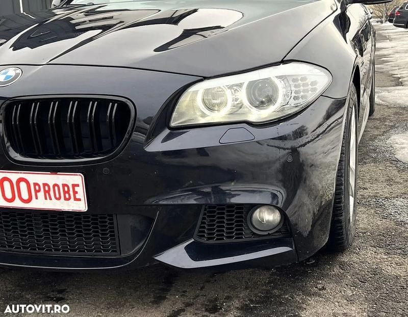 Second-hand BMW 520 184 CP (135 kW) 2014 Culoarealbastru Berlinǎ