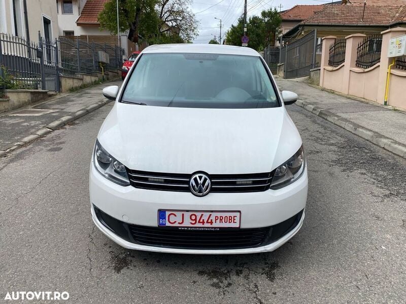 Second-hand VW Touran Comfortline 110 CP (80 kW) 2012 Alb Monovolum