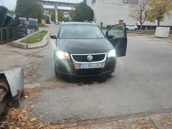 Second-hand VW Touran 105 CP (77 kW) 2009 Negru Monovolum
