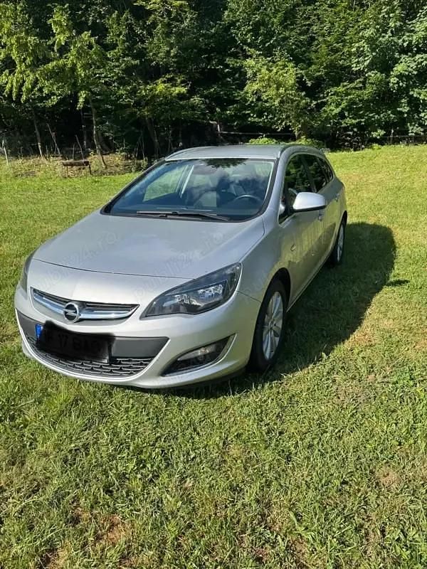 Argintiu Utilizat 2017 Opel Astra Break | 5.449 EUR (Preț bun) - Imagine 1/4