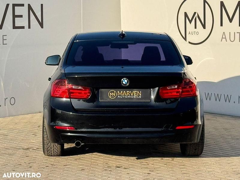 Second-hand BMW 318 143 CP (105 kW) 2013 Culoarenegru Berlinǎ