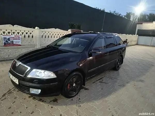 Negru Utilizat 2006 Skoda Octavia Break | 3.520 EUR (Preț OK) - Imagine 1/4