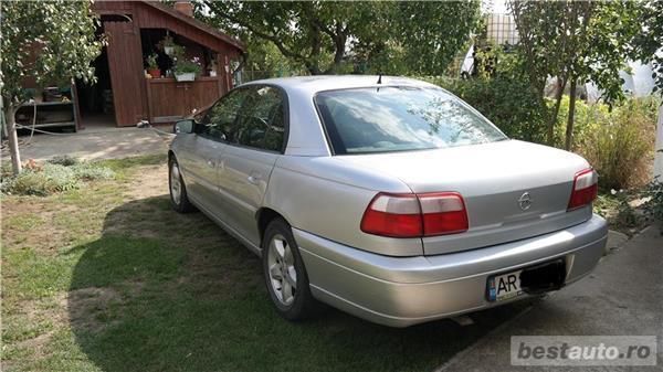 Second-hand Opel Omega 130 CP (95 kW) 2003 Argintiu metalizat Berlinǎ
