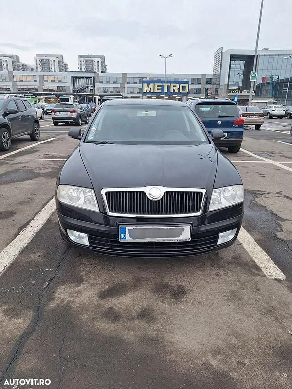 Culoarenegru Utilizat 2008 Skoda Octavia Business Line Berlinǎ | 3.750 EUR (Preț OK) - Imagine 1/4