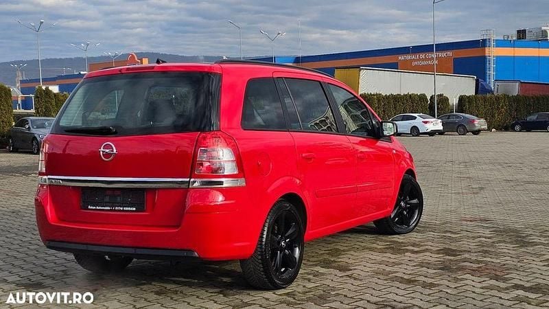 Second-hand Opel Zafira Family 140 CP (102 kW) 2013 Culoarerosu Monovolum