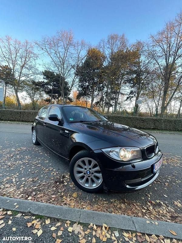 Culoarenegru Utilizat 2010 BMW 116 Hatchback | 4.750 EUR (Preț OK) - Imagine 1/4