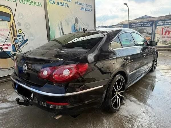 Second-hand VW Passat R-line 170 CP (125 kW) 2011 Negru Berlinǎ