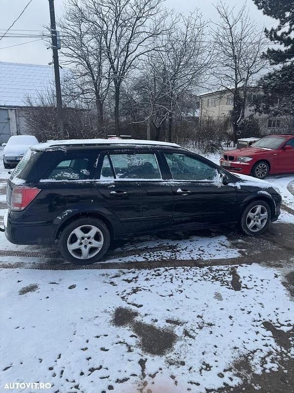 Culoarenegru Utilizat 2008 Opel Astra Cosmo Break | 2.300 EUR (Puțin scump) - Imagine 1/4