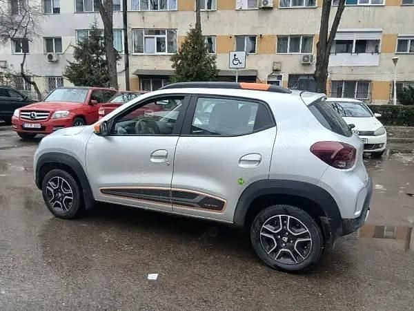 Auriu Second-hand 2022 Dacia Spring Hatchback | 7.850 EUR (Preț bun) - Imagine 1/4