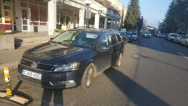 Utilizat 2014 VW Passat Break | 7.800 EUR (Puțin scump) - Imagine 1/4