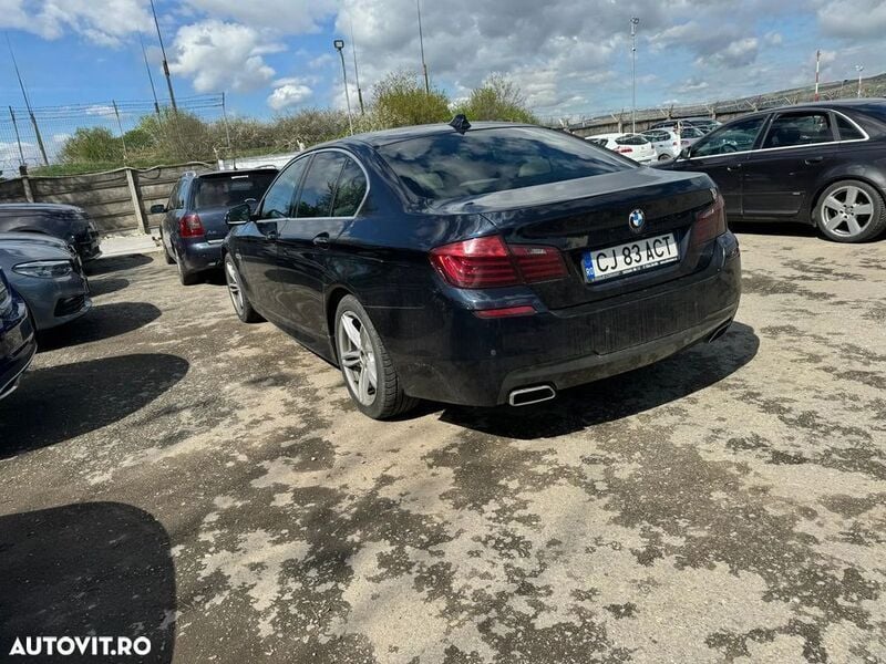 Second-hand BMW 535 Comfort Edition 313 CP (230 kW) 2014 Negru Berlinǎ