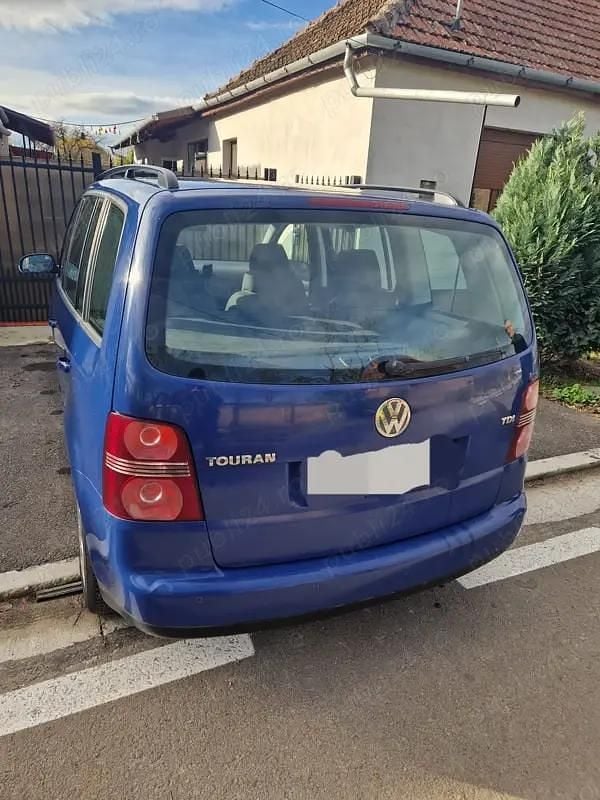Utilizat 2006 VW Touran Monovolum | 1.500 EUR (Preț bun) - Imagine 1/4