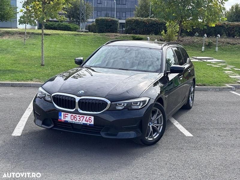 Culoarenegru Utilizat 2021 BMW 320e Sport Line Break | 23.837 EUR (Preț OK) - Imagine 1/4