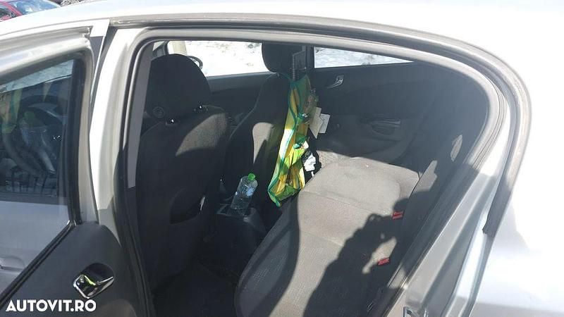 Second-hand Opel Corsa 100 CP (73 kW) 2011 Culoareargint Hatchback