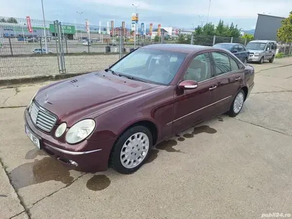 Violet Utilizat 2004 Mercedes E240 Berlinǎ | 8.950 EUR - Imagine 1/4