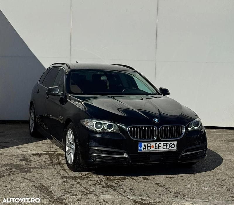 Second-hand BMW 520 Comfort Edition 184 CP (135 kW) 2015 Culoarenegru Break