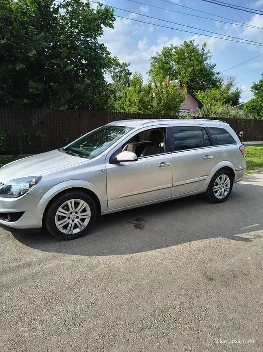 Gri Utilizat 2009 Opel Astra Break | 1.800 EUR (Preț OK) - Imagine 1/4