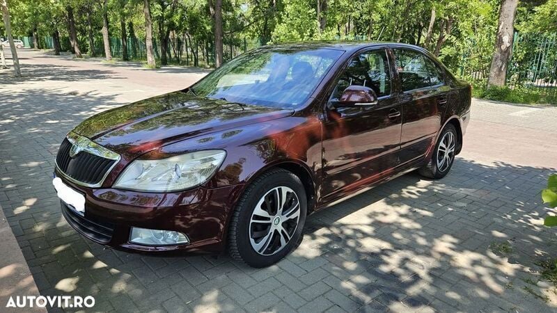 Rosu Utilizat 2011 Skoda Octavia Classic Berlinǎ | 5.450 EUR (Preț OK) - Imagine 1/4