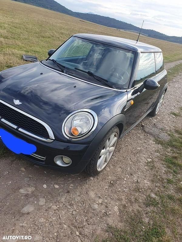 Culoarenegru Utilizat 2007 Mini Cooper Hatchback | 2.100 EUR (Super Preț) - Imagine 1/4