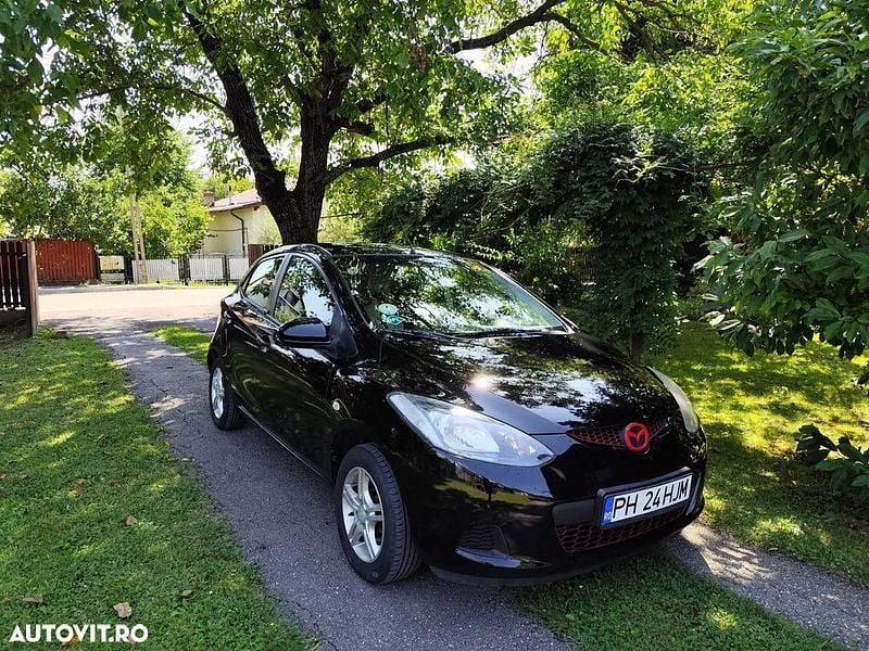 Culoarenegru Utilizat 2010 Mazda 2 | 2.975 EUR - Imagine 1/4