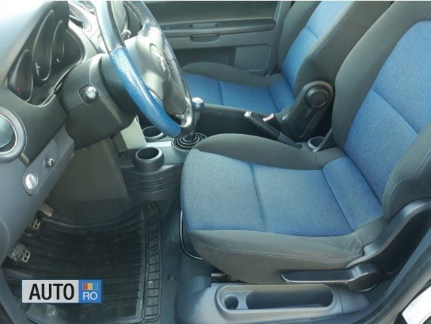 Second-hand Mitsubishi Colt 75 CP (55 kW) 2007 Negru Hatchback