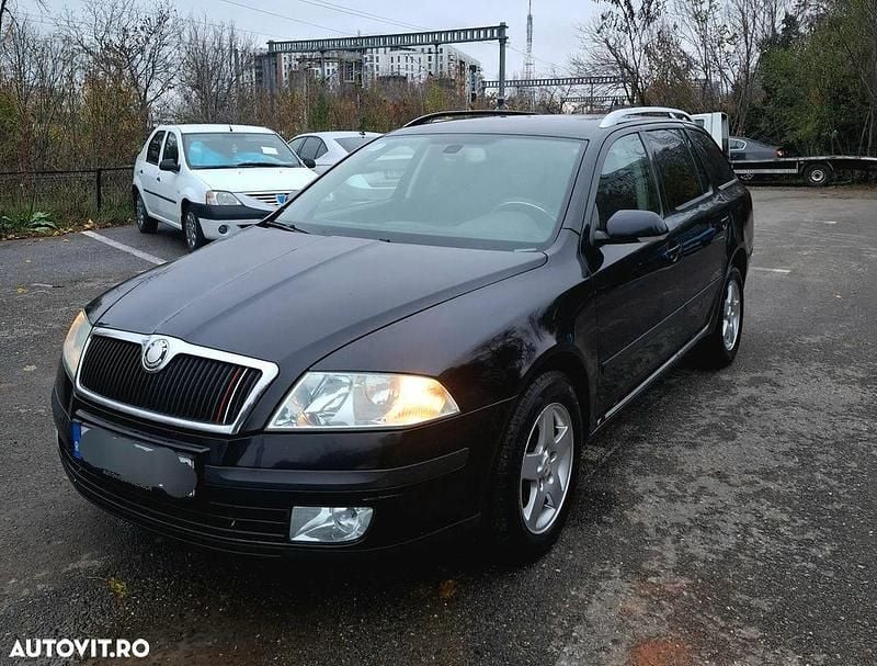 Culoarenegru Utilizat 2006 Skoda Octavia Break | 1.750 EUR (Super Preț) - Imagine 1/4